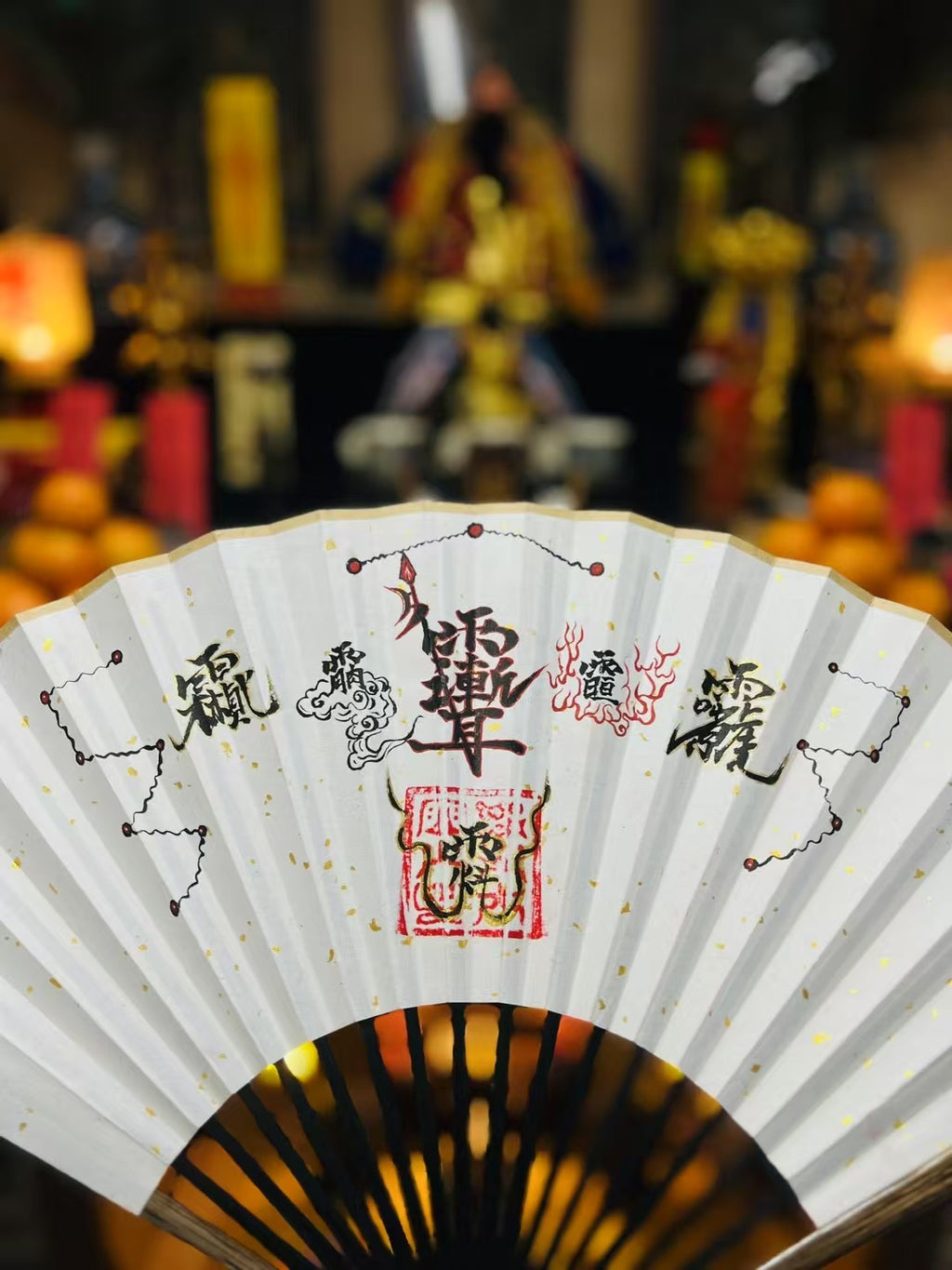 Fan-shaped talismans