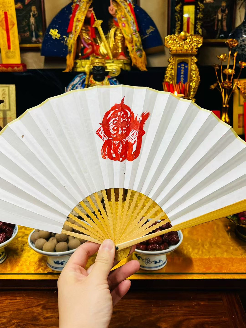 Fan-shaped talismans